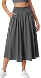 L'ourlet en ligne A de la jupe couvre astucieusement les hanches et les jambes, ce qui la rend adaptée à toutes les morphologies. Elle ajoute une touche de décontraction et d'élégance à votre look, créant une atmosphère douce