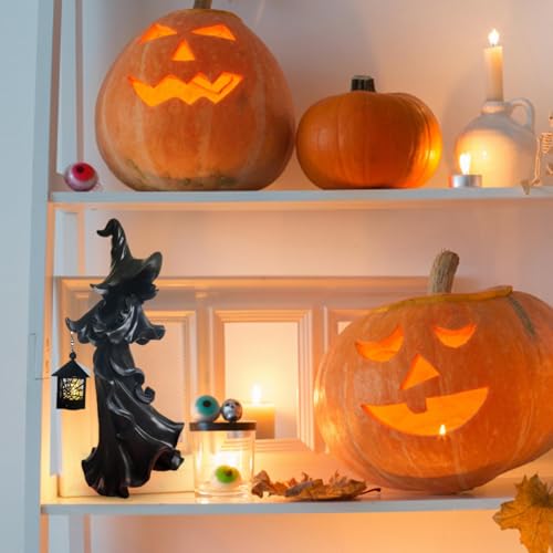Sorcière d'Halloween avec lanterne pour décoration de fête et jardin extérieur