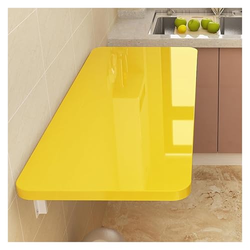 Table murale pliable pour aménager un studio sans encombrer