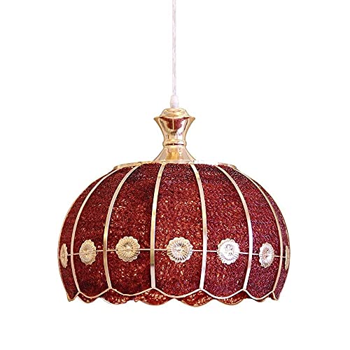 Lustre suspendu en verre coloré diffusant une lumière chaleureuse