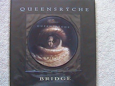 Album Art for QUEENSRYCHE "THE BRIDGE" 7" PICTURE DISC WITH SUBWAY SIZED POSTER OF THE BAND by Queensryche