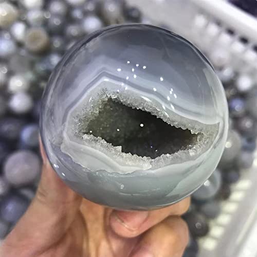 Pierre de cristal en boule d'agate transparente d'exception avec géode naturelle
