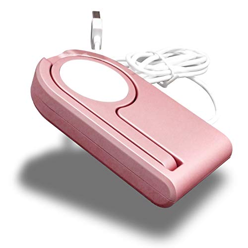 Chargeur iWatch rose pliable contre l'encombrement sur la table de nuit