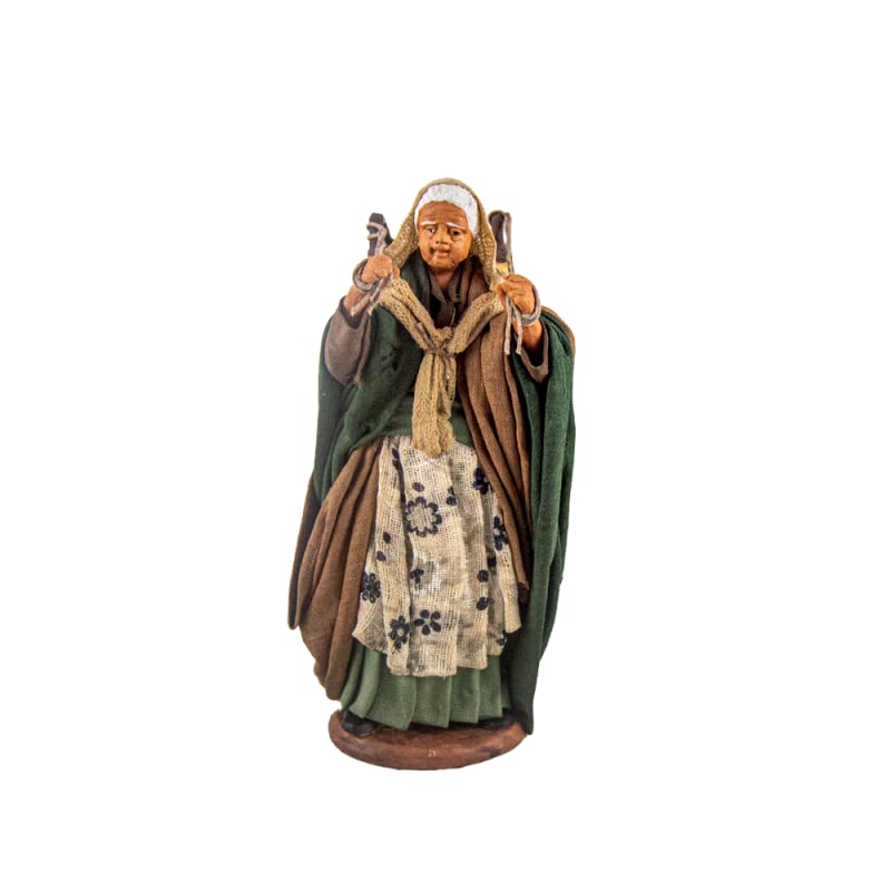 Tradizione Napoletana: Realizzata con cura in materiali di alta qualità, questa figura aggiunge un tocco di pastorizia e tradizione alla scena del tuo presepe, rappresentando una donna con un cesto contenente pecore.