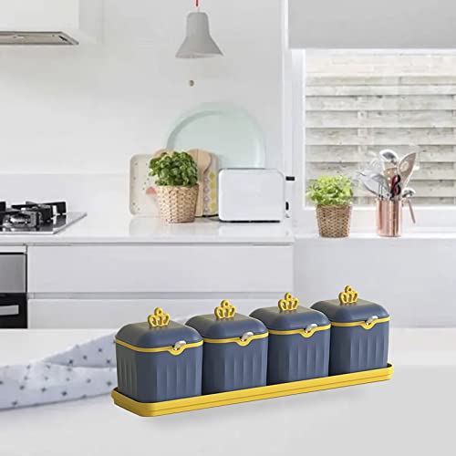 Pots à épices avec couvercle et cuillère bleu pour une table conviviale