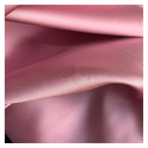 Tissu mikado satiné rigide de luxe vert pour structurer une robe sans affaissement