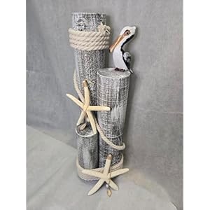 Pelicanonwoodpilingsnauticalstatuewithhangingstarfishcoastaldecorforporchgardenorpoolsidemarinebirdsculpturenauticaldecor  Urban Country Home Decor Pelican on wood pilings nautical statue with hanging starfishcoastal decor for porch garden or poolside marine bird sculpture nautical decor  urban country home decor