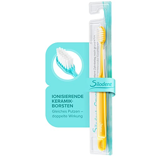 Silodent Crystal Keramik Zahnbürste - Handzahnbürste mit dem Ioneneffekt - Zahnbürsten mit Keramikborsten für extra glatte Zähne - Weiche Zahnbürste mit Magneteffekt - Putzt doppelt so gut (orange) Cover