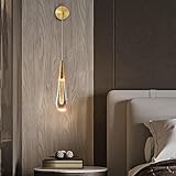 Applique murale design moderne : Cette suspension moderne est dotée d'un cylindre en cristal de qualité supérieure avec une finition dorée polie, à la fois élégante et contemporaine. La lumière est magnifiquement réfractée, lui conférant un aspect unique. Très lumineuse tout en étant douce pour les yeux, elle est idéale pour lire, travailler, étudier ou se maquiller.