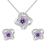 conjunto pendientes y colgante lotus EXCLUSIVIDAD: Para realzar aún más la elegancia de este diseño, se aplica sobre la plata de colgante, cadena y pendientes un baño electrolítico de Platino puro (99,5%) de 2,5 micras de espesor