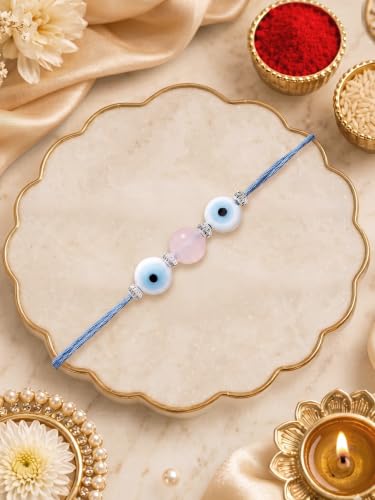 Image of Karatcart Elegant Pink Bead Handmade Evil Eye Rakhi for Brother with Roli & Chawal
