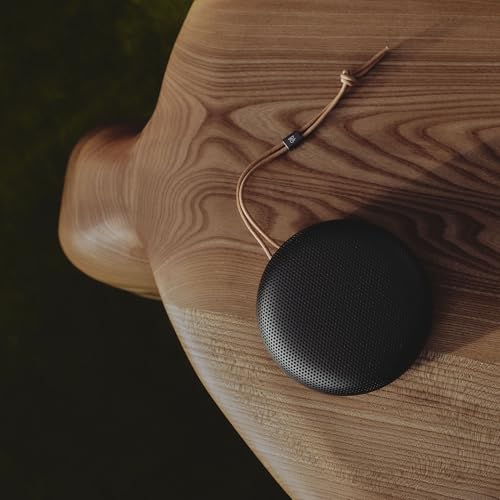 Image of Bang & Olufsen Beosound A1 (3rd gen) - Portable Compact Wireless Bluetooth Speaker, Waterproof (IP67), C2C Certified, up to 24 Hours of Playtime and 3 Microphones for Voice Calls - Warm Granite