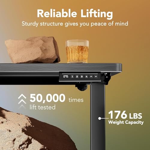 Image of HUANUO Electric Standing Desk, 71 inch x 30 inch Height Adjustable Desk, 4 Memory Height Settings, Sit to Stand Up Desk for Home Office, with Headphone Hook, Cable Manager, Walnut