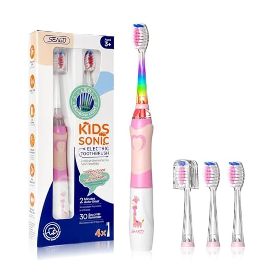 Seago Cepillo electrico infantil, Cepillo de dientes infantil con luz de colores, 4 cabezal de recambio extra suaves, Temporizador de 2 minutos, Apto para niños mayores de 3 años SG977 (Rosa)