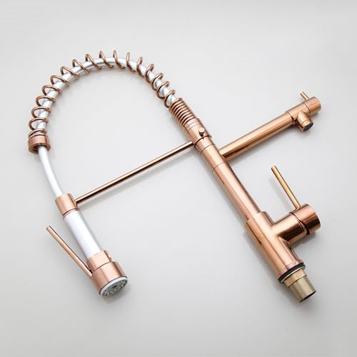 Mitigeur d'évier or rose pour eau chaude et froide dans une cuisine moderne