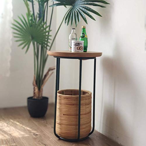 Mesa revistero pequeña para resolver el desorden junto al sofá del salón 3