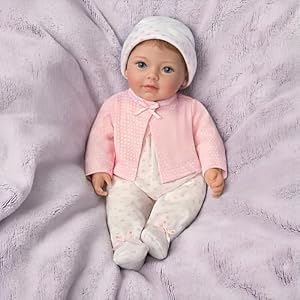 The Ashton Drake Galleries Little Ellie Tiny Miracles Lifelike Baby Girl Doll Realistic Hand Rooted Hair Fully Poseable with Soft RealTouch Vinyl Skin and Bean Bag Body Ages 3 and Up 10 Inches