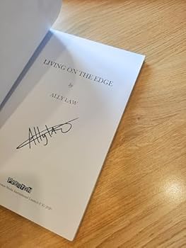 Paperback Living on the Edge Book