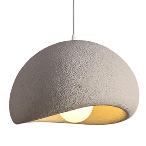Suspension créative style minimaliste français pour illuminer un salon chaleureux et moderne