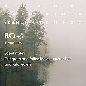 Skandinavisk RO 'Tranquility' Scented Candle. Fragrance Notes: Cut Grasses and Fallen Leaves, Cucumber and Wild Violets. 7.0 oz. Skandinavisk RO Tranquility Scented Candle Fragrance Notes Cut Grasses and Fallen Leaves Cucumber and Wild Violets 70 oz