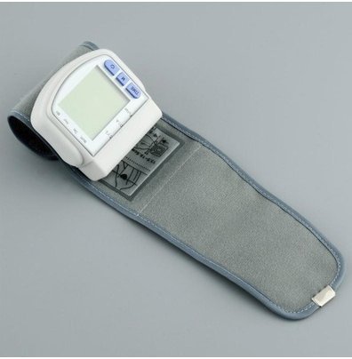 Technuv CK-102S Blood Pressure Monitor with cuff laid flat