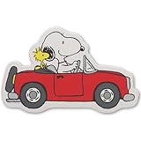 Peanuts licensed product: Cruise down memory lane with this colorful wall decor! This die-cut sign captures the essence of adventure and friendship in a whimsical and captivating way. Fun Vintage Sign: Snoopy takes the wheel of a classic red converti...