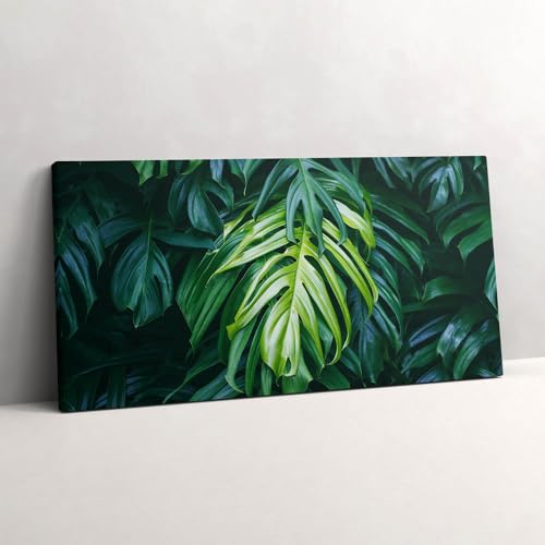Tableau feuilles de monstera 140x70cm Wallfluent pour réchauffer un mur blanc vide