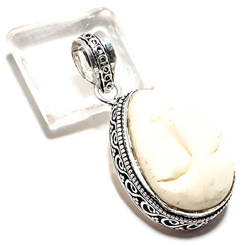 Pendentif visage d'os sculpté en argent 925 fait main unique