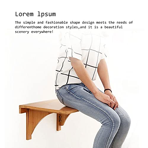 Table pliante murale en bois pour ordinateur dans un studio compact