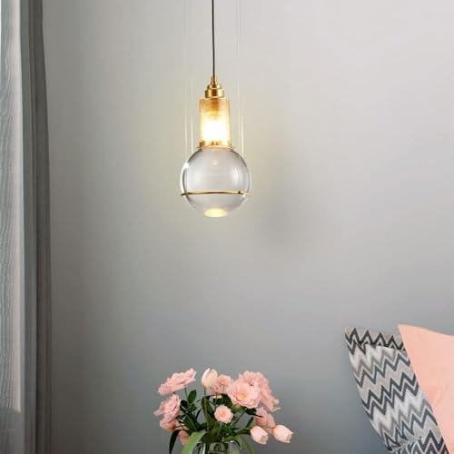 Plafonnier suspendu en cristal doré au design moderne et finitions de prestige