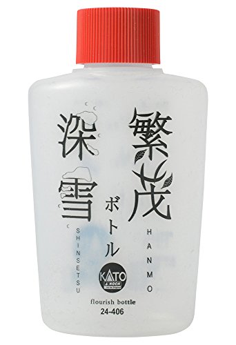 Kato Bouteille pour disperser l'herbe sans faire de paquets sur vos maquettes