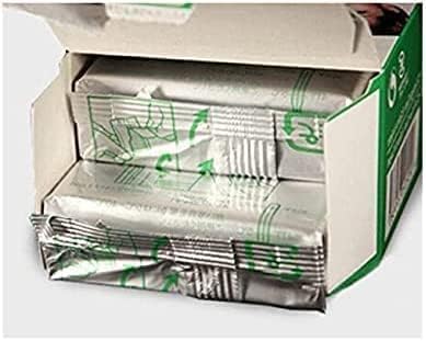 A Fujifilm Instax Mini film pack being inserted into the camera's film compartment.