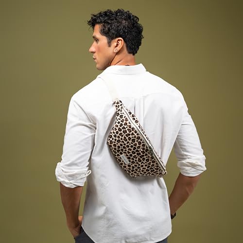 Image of The Peacock Crew Canvas Crossbody Sling Bag for Men & Women - Adjustable Strap, Dual Zippers Left /Right Handed, Secure Everyday Travel Fanny Pack Shoulder Pouch, Trekker Leopard, 14.5 x 6.3 x 3.6