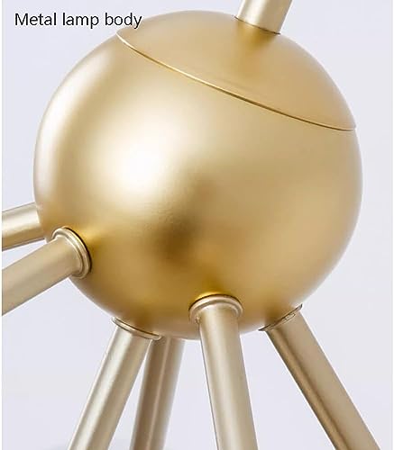Lustre suspendu moderne en or brossé doté de globes blancs dépolis