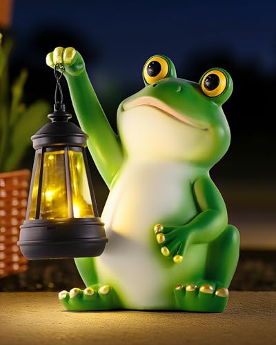 Grenouille solaire de jardin contre l'obscurité des allées et terrasses