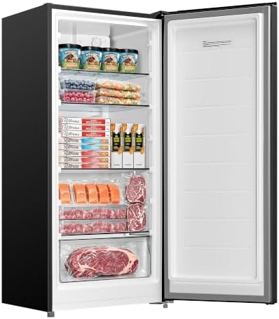 Black single-door upright freezer with a recessed handle, shown closed against a plain background