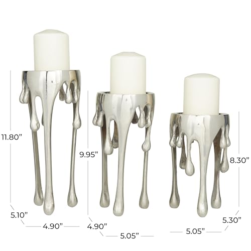 Image of CosmoLiving by Cosmopolitan Aluminum Metal Abstract Decorative Candle Holder Melting Drip Candle Stand, Set of 3 Candlestick Holder 12 inch, 10 inch, 8 inchH, Silver