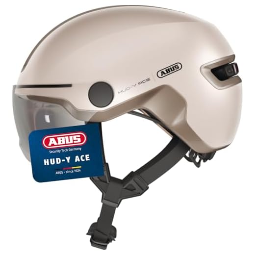 ABUS Stadthelm HUD-Y ACE - stylischer Fahrradhelm mit Visier und magnetischem, aufladbarem LED-Rücklicht - für Damen und Herren - Beige, Größe M