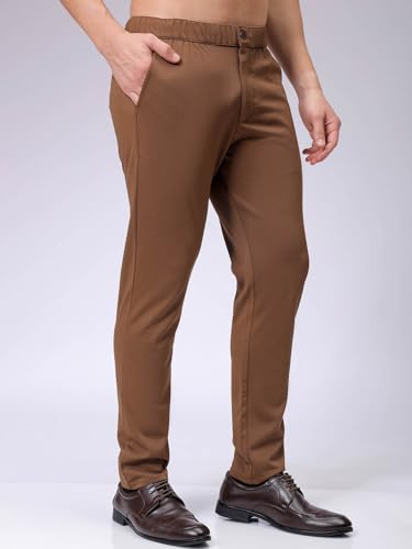 Image of The Indian Garage Co Men Slim Fit Solid Mid-Rise Stretchable Knitted Jogger Trousers
