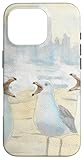 Élégante illustration aquarelle de trois mouettes au bord du rivage, capturant la liberté côtière et la beauté naturelle.