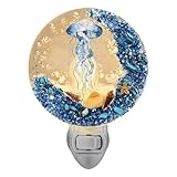 Ambiance sur le thème de l'océan : offrez-vous une ambiance océanique fascinante avec notre veilleuse en forme d'animal . Avec une gamme de motifs s, notamment des poissons, des coraux, des algues et des étoiles de mer, cette lampe transforme votre chambre en une oasis sous-e paisible.