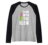 Design « Flow With The Glow » avec une lampe à lave rétro avec des formes liquides vibrantes, parfaite pour les fans d'esthétique des années 70 et de décoration vintage.
