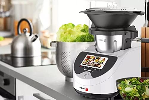 User removing the mixing bowl from the Fagor Connect Food Processor base