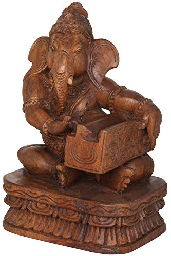 Ganesha tocando harmonium figura madera templo sur de India 3