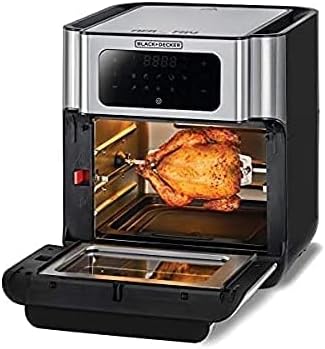 The BLACK+DECKER 12L Deep Fryer AOF100-B5 with its door open, showing a whole roasted chicken on the rotisserie spit inside.