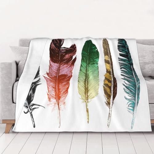 Couverture flanelle plumes pour soirées cocooning sur canapé