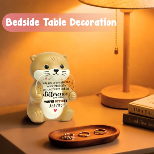 Figurine de loutre fière de la différence que vous faites en résine