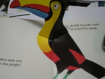 Paperback Who Sees You In Jungl (Little Pop-and-peek Book) Book