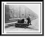 Historic Framed Print, [Woman standing on electric shop truck, Watervliet Arsenal, Watervliet, N.Y., during World War I], 17-7/8" x 21-7/8"
