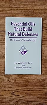 Paperback Essential Oils That Build Natural Defenses The Science of Aromatheraphy Book